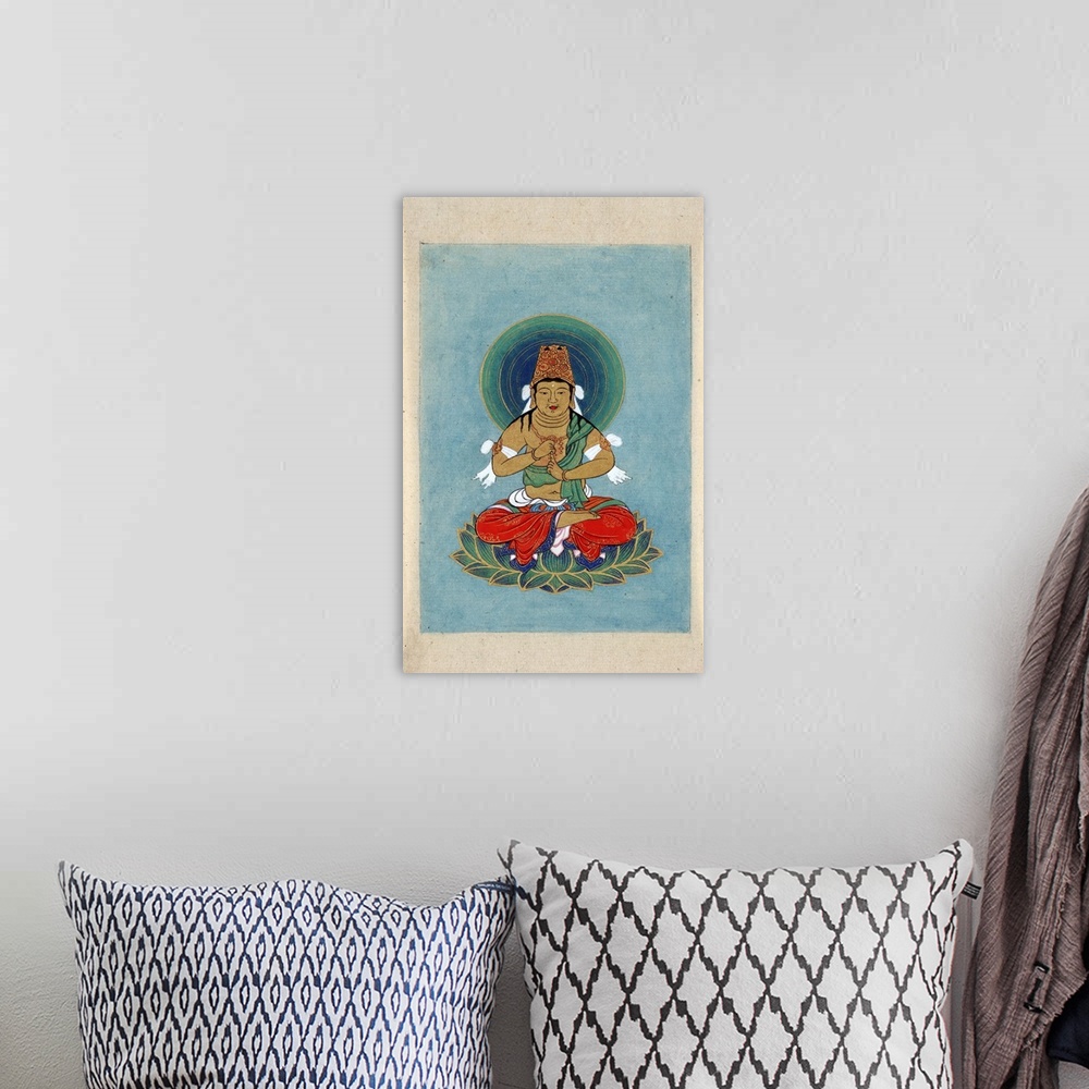 A bohemian room featuring Artwork of Buddhist figure.