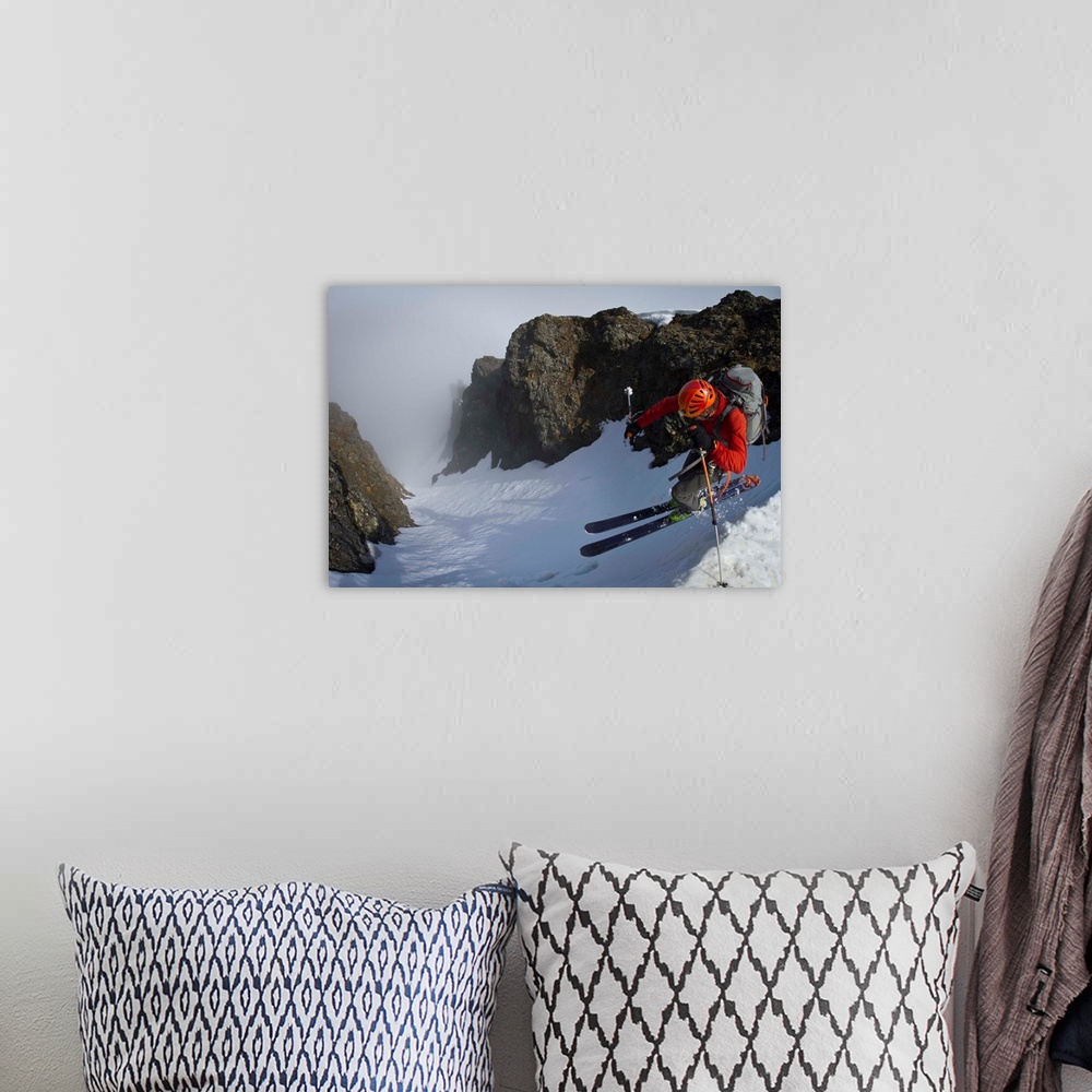 A bohemian room featuring Backcountry skier on West Twin Peak near Eklutna, Western Chugach Mountains, Alaska, Winter.