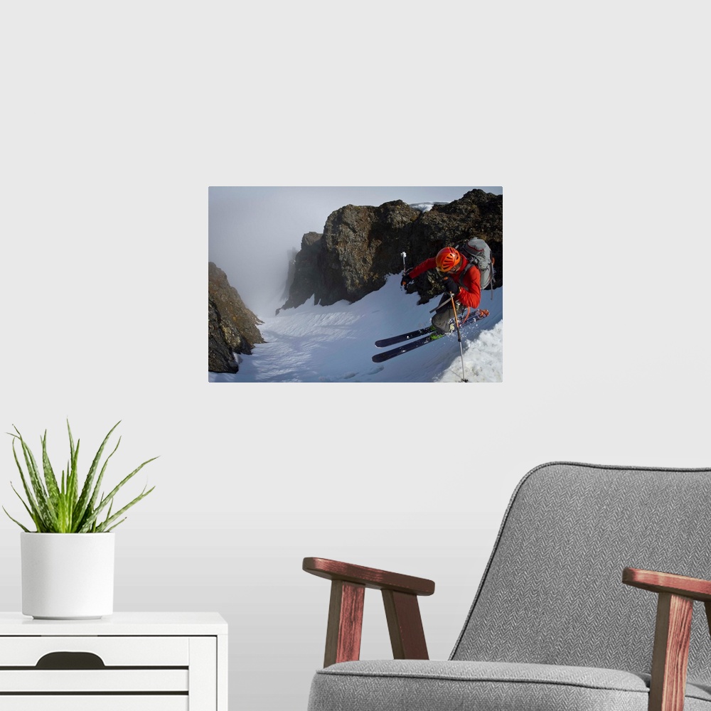 A modern room featuring Backcountry skier on West Twin Peak near Eklutna, Western Chugach Mountains, Alaska, Winter.