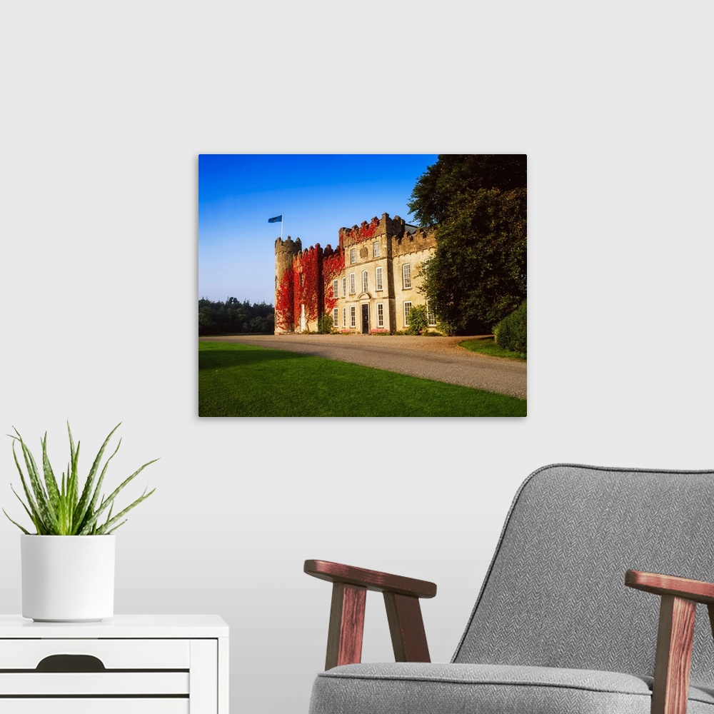 A modern room featuring Ballinlough Castle, Westmeath, Ireland, Late Summer.