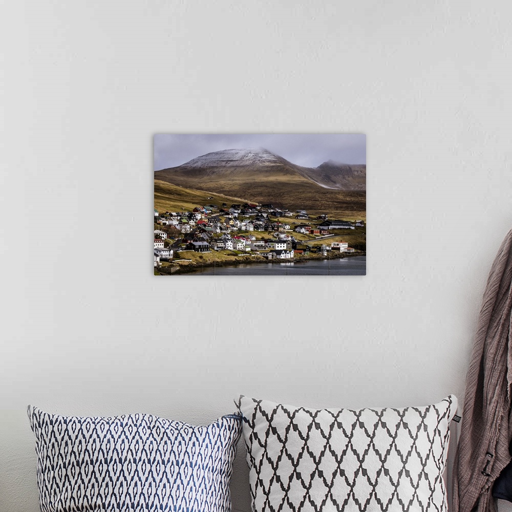 A bohemian room featuring Beautiful country houses of Sandavagur village in Faroe Islands.