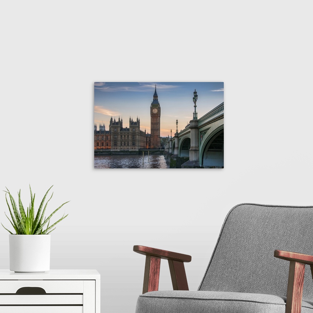 A modern room featuring Big Ben and Westminster bridge at dusk.