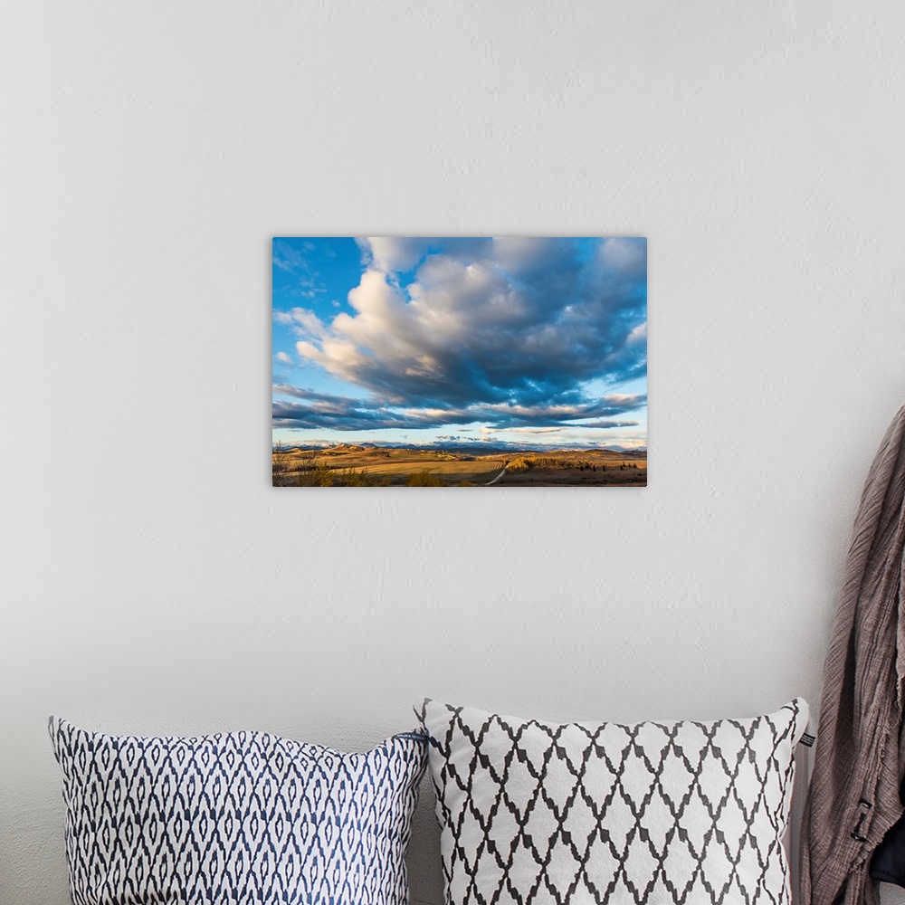 A bohemian room featuring Big prairie sky, near Longview, Alberta, Canada.