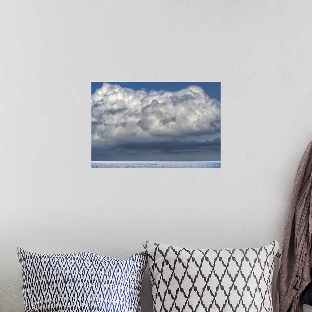 A bohemian room featuring Billowing and stormy cloud formations over the ocean; South Shields, Tyne and Wear, England.