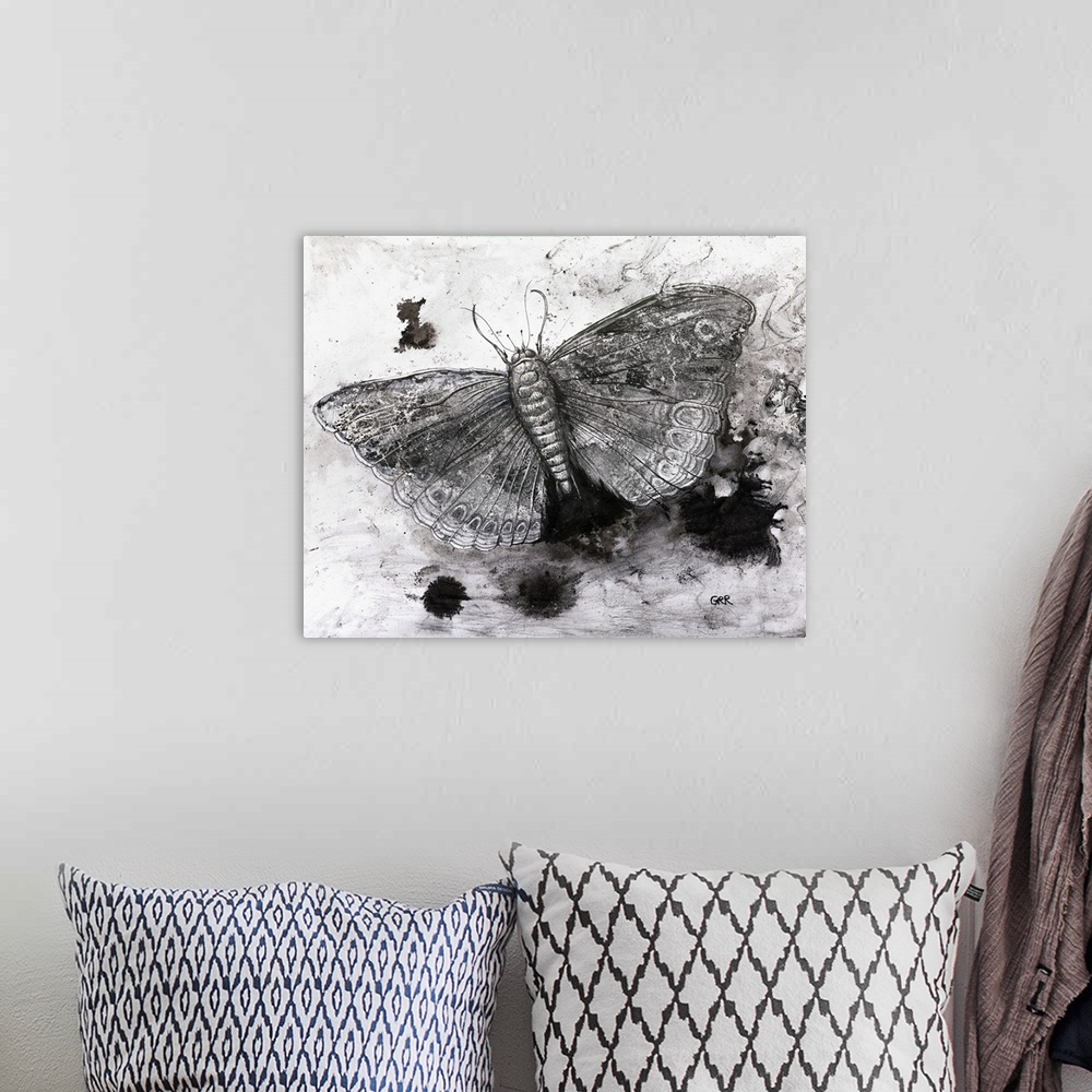 A bohemian room featuring Black and white illustration of a butterfly.
