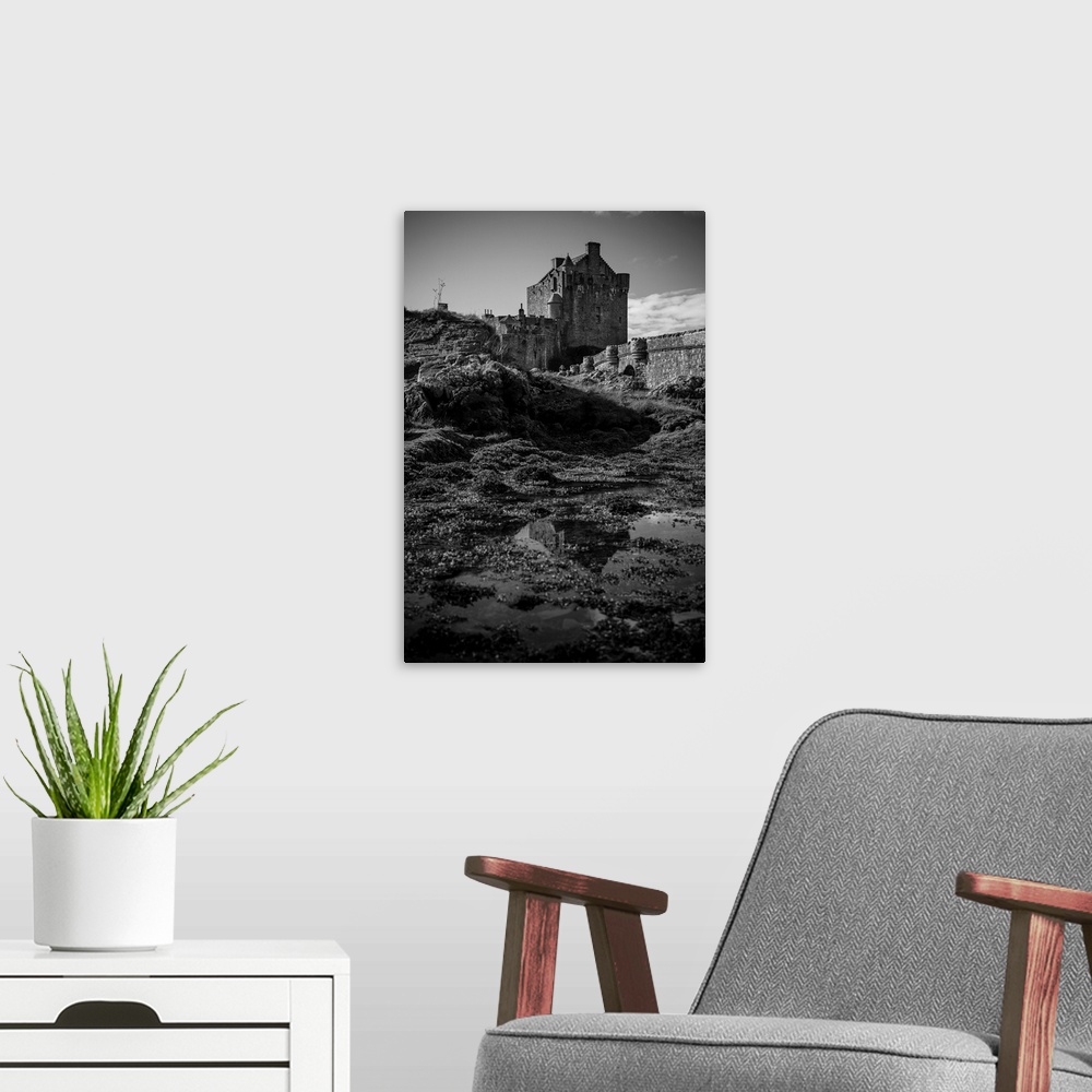 A modern room featuring Black and white image of a castle, isle of Skye, Scotland.