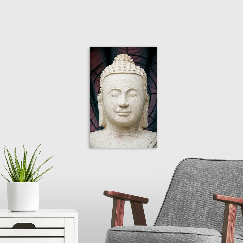 A modern room featuring Buddha statue.