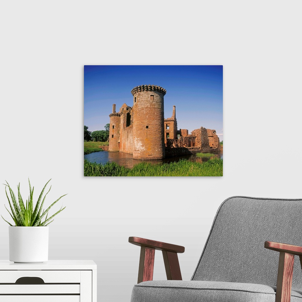 A modern room featuring Caerlaverock Castle, Dumfries, Scotland