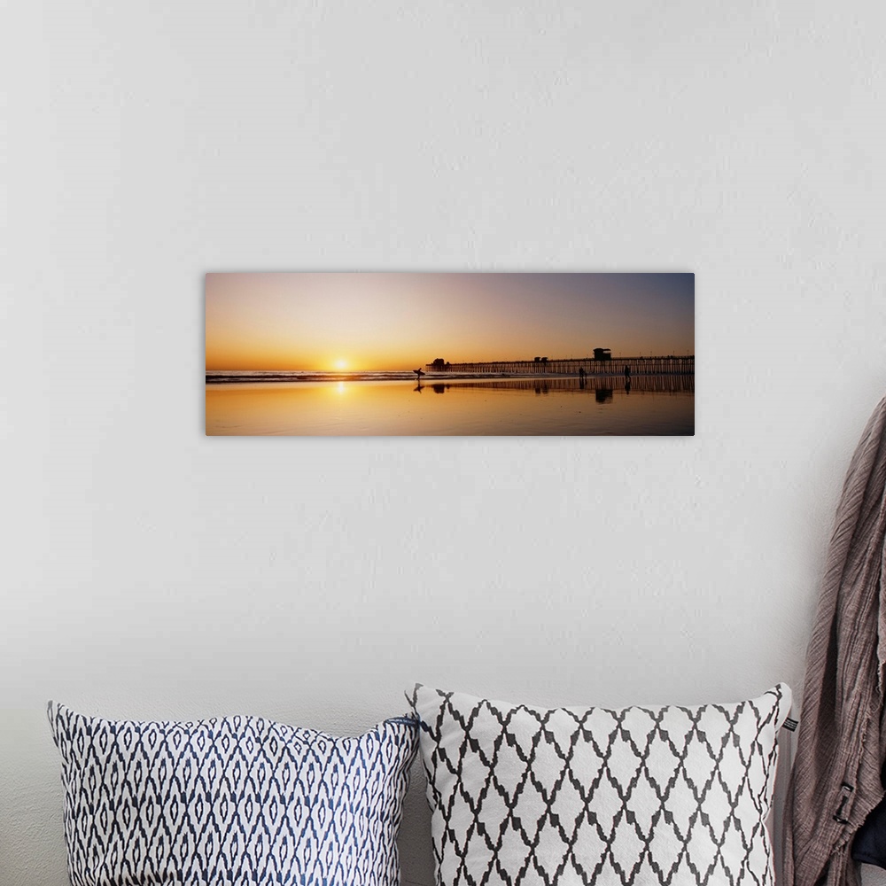 A bohemian room featuring California, Oceanside Pier And Surfers Silhouetted Against Sunset