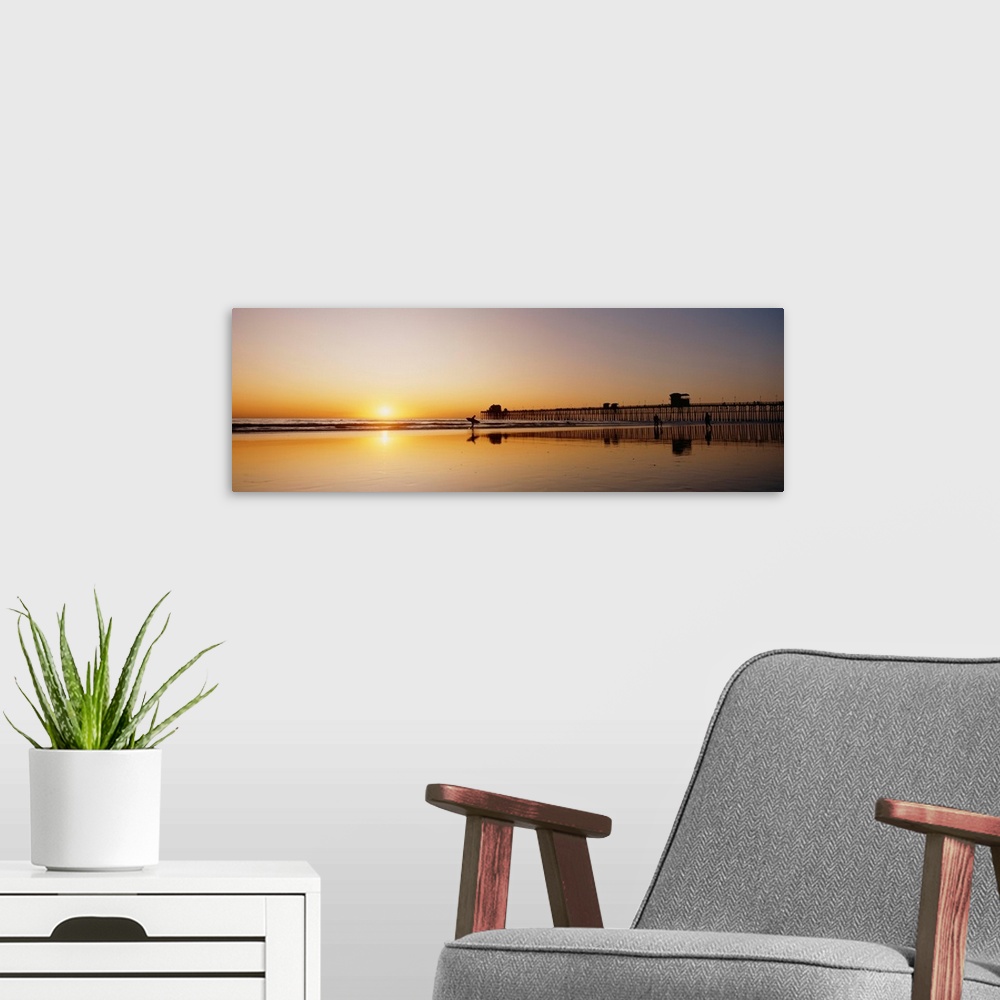 A modern room featuring California, Oceanside Pier And Surfers Silhouetted Against Sunset