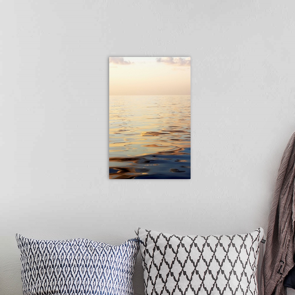 A bohemian room featuring Calm Sea Surface With Sunset, Low Angle View