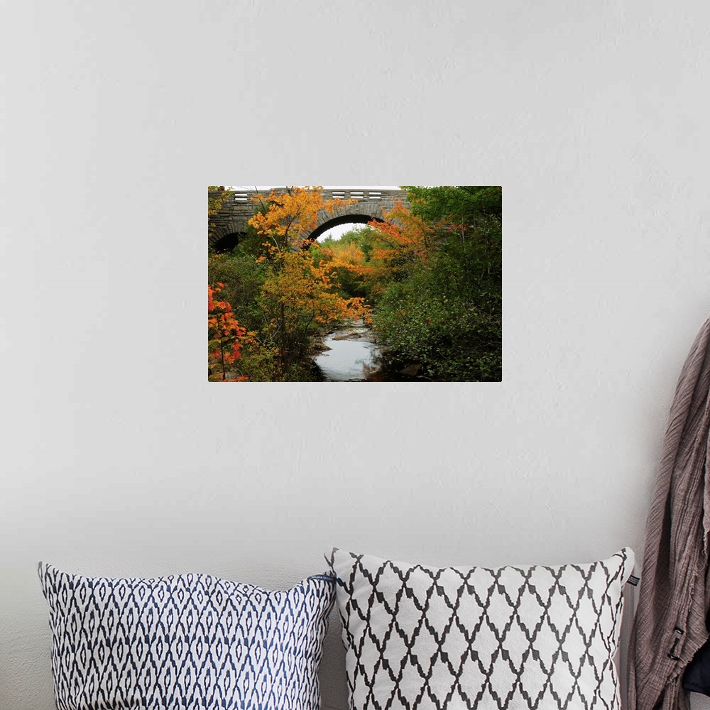A bohemian room featuring Carriage road bridge at Duck Brook in Acadia National Park.