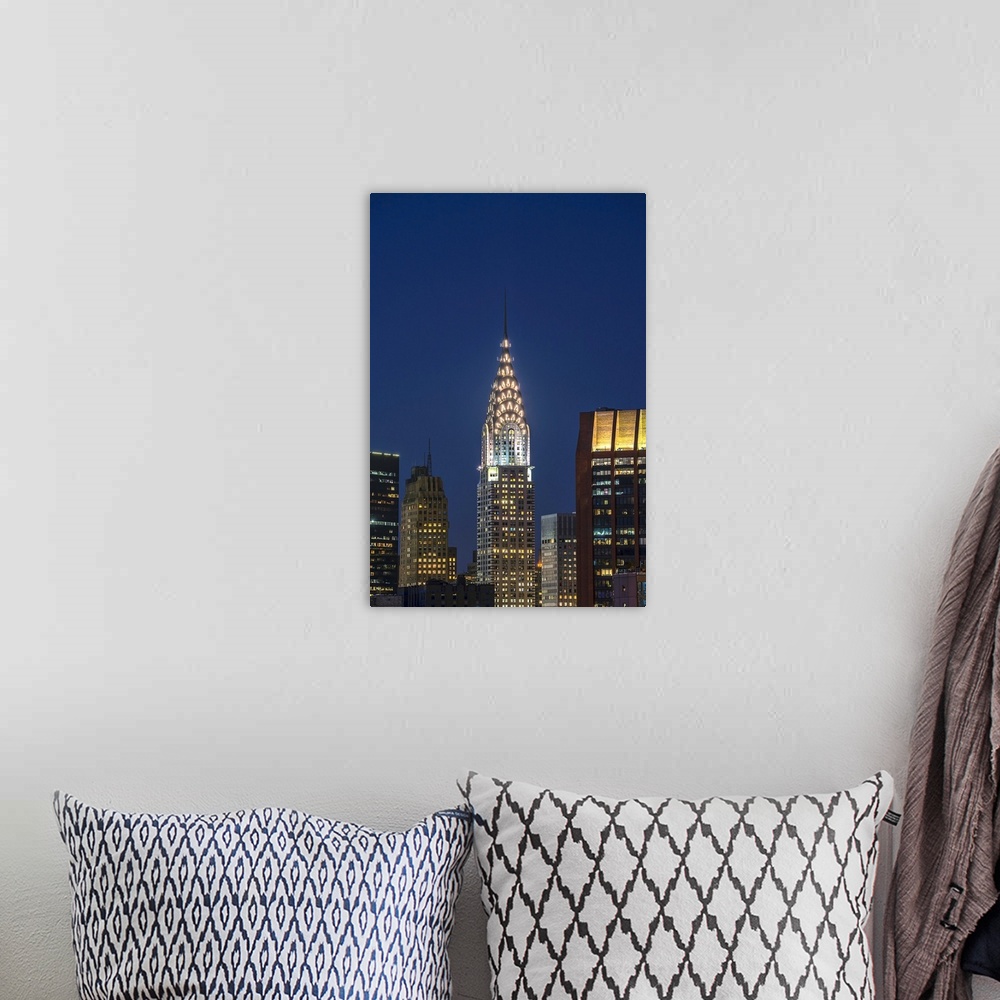 A bohemian room featuring Chrysler Building at twilight. New York City, New York, United States of America.