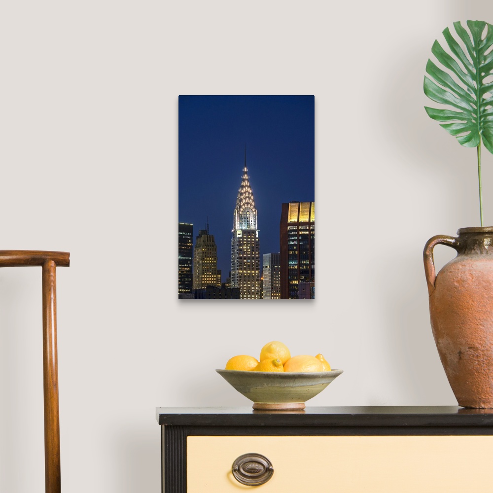 A traditional room featuring Chrysler Building at twilight. New York City, New York, United States of America.