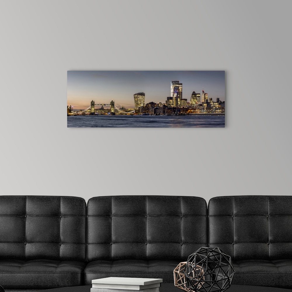 A modern room featuring Cityscape and skyline of London at dusk with 20 Fenchurch, 22 Bishopsgate, and various other skys...