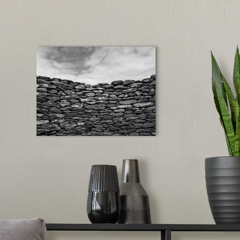 A modern room featuring Close-up of a stone wall and clouds in the sky, Ballyferriter, county Kerry, Ireland.