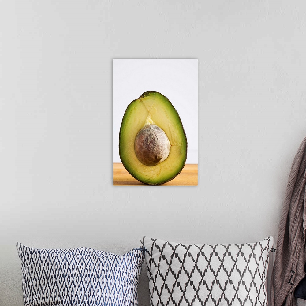 A bohemian room featuring Close Up Of An Avocado Standing Upright Cut In Half With The Pit