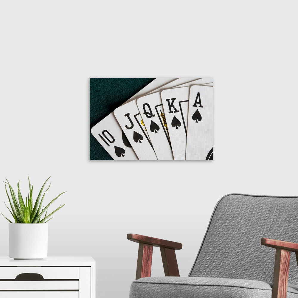 A modern room featuring Close-Up Of Blackjack Playing Cards Showing Spades Royal Flush