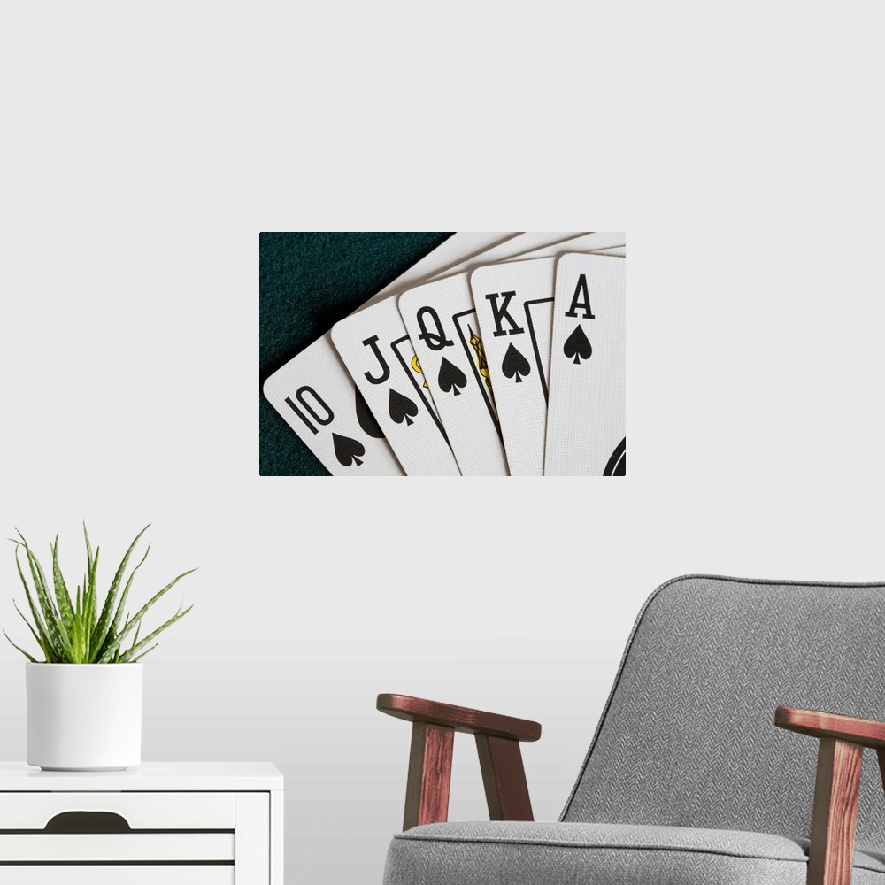 A modern room featuring Close-Up Of Blackjack Playing Cards Showing Spades Royal Flush