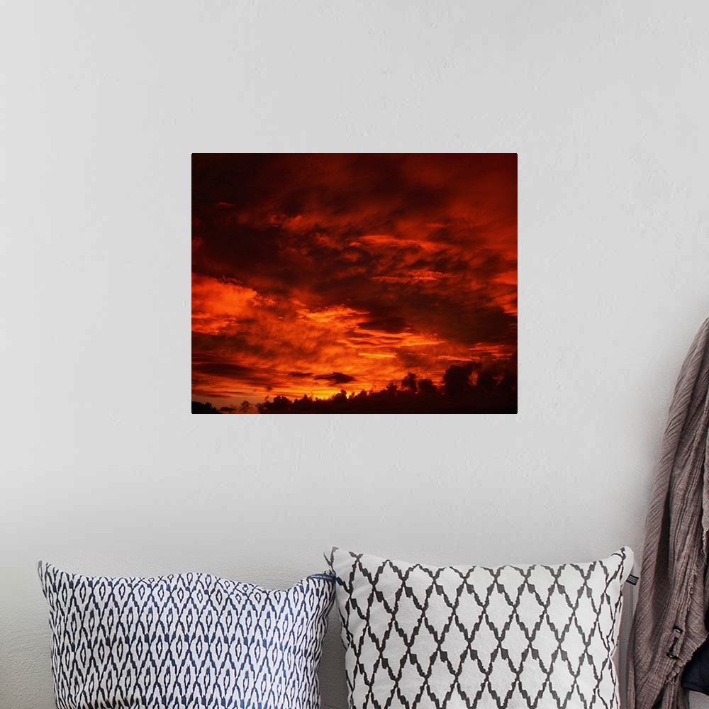 A bohemian room featuring Co Kerry, Ireland; red cloudscape and sunset.