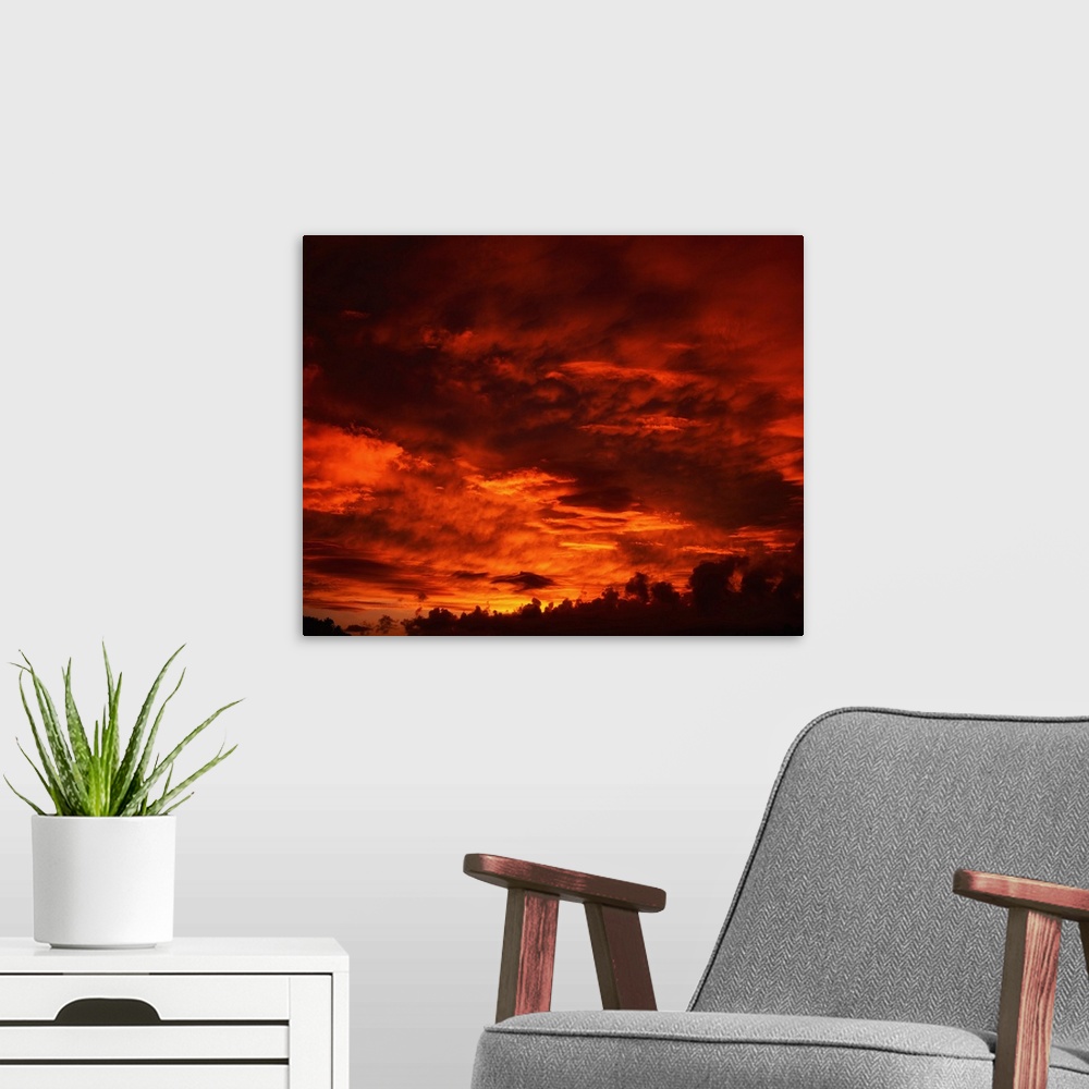 A modern room featuring Co Kerry, Ireland; red cloudscape and sunset.