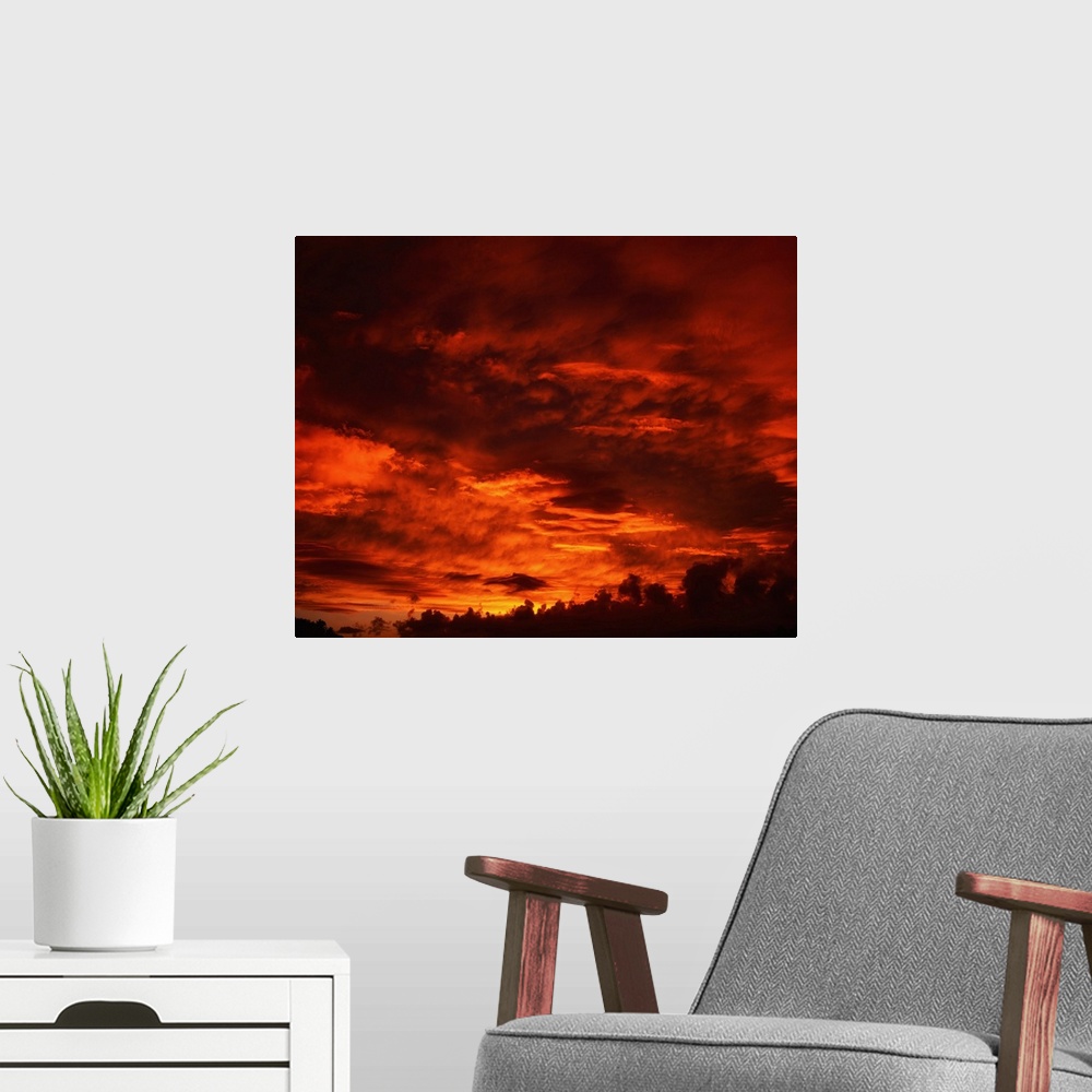 A modern room featuring Co Kerry, Ireland; red cloudscape and sunset.
