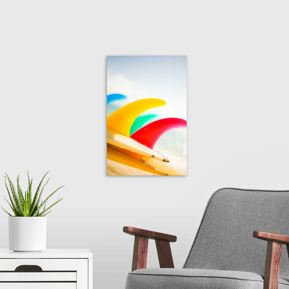 A modern room featuring Colorful Surfboards Fins, Bright Sunny Sky In Background