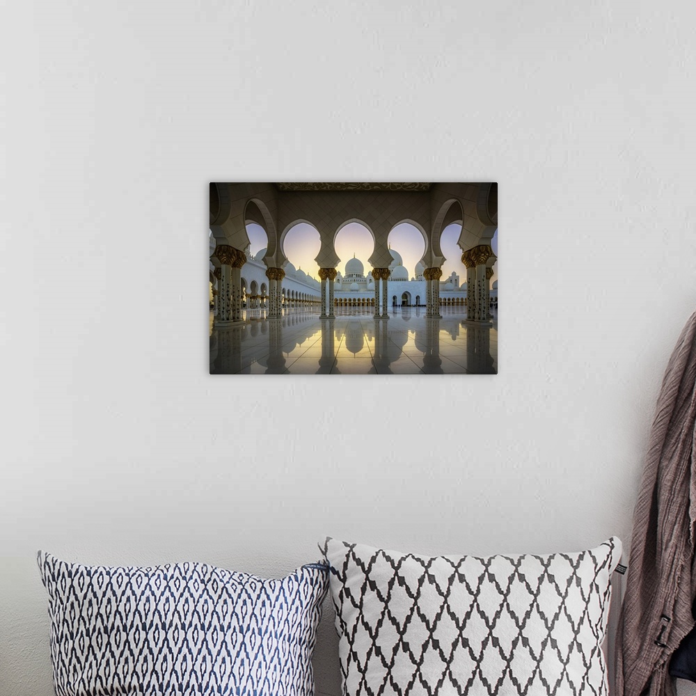 A bohemian room featuring Columns and arches of the Grand Mosques at sunset.