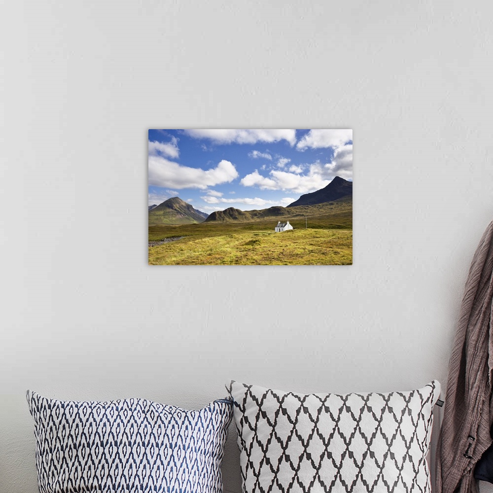 A bohemian room featuring Cottage on Heather Moorland, Cuillin Hills, Isle of Skye, Inner Hebrides, Scotland