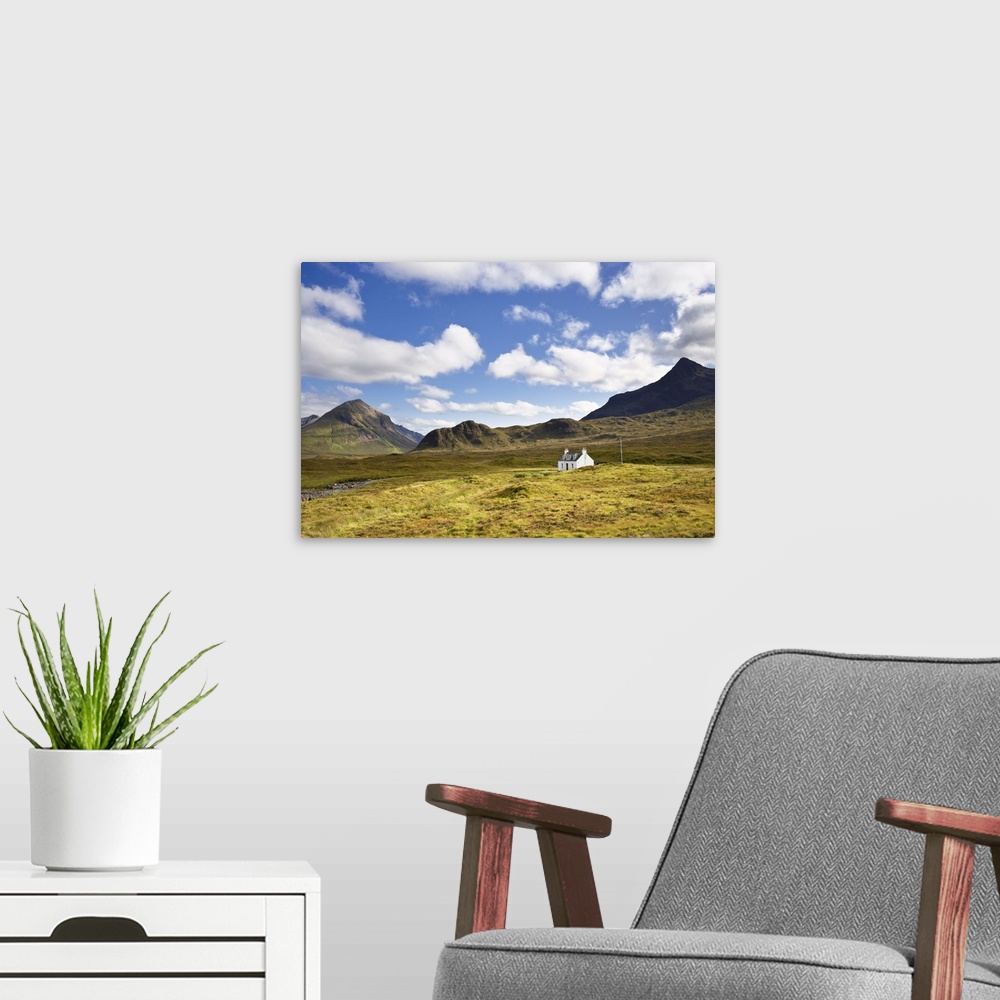 A modern room featuring Cottage on Heather Moorland, Cuillin Hills, Isle of Skye, Inner Hebrides, Scotland