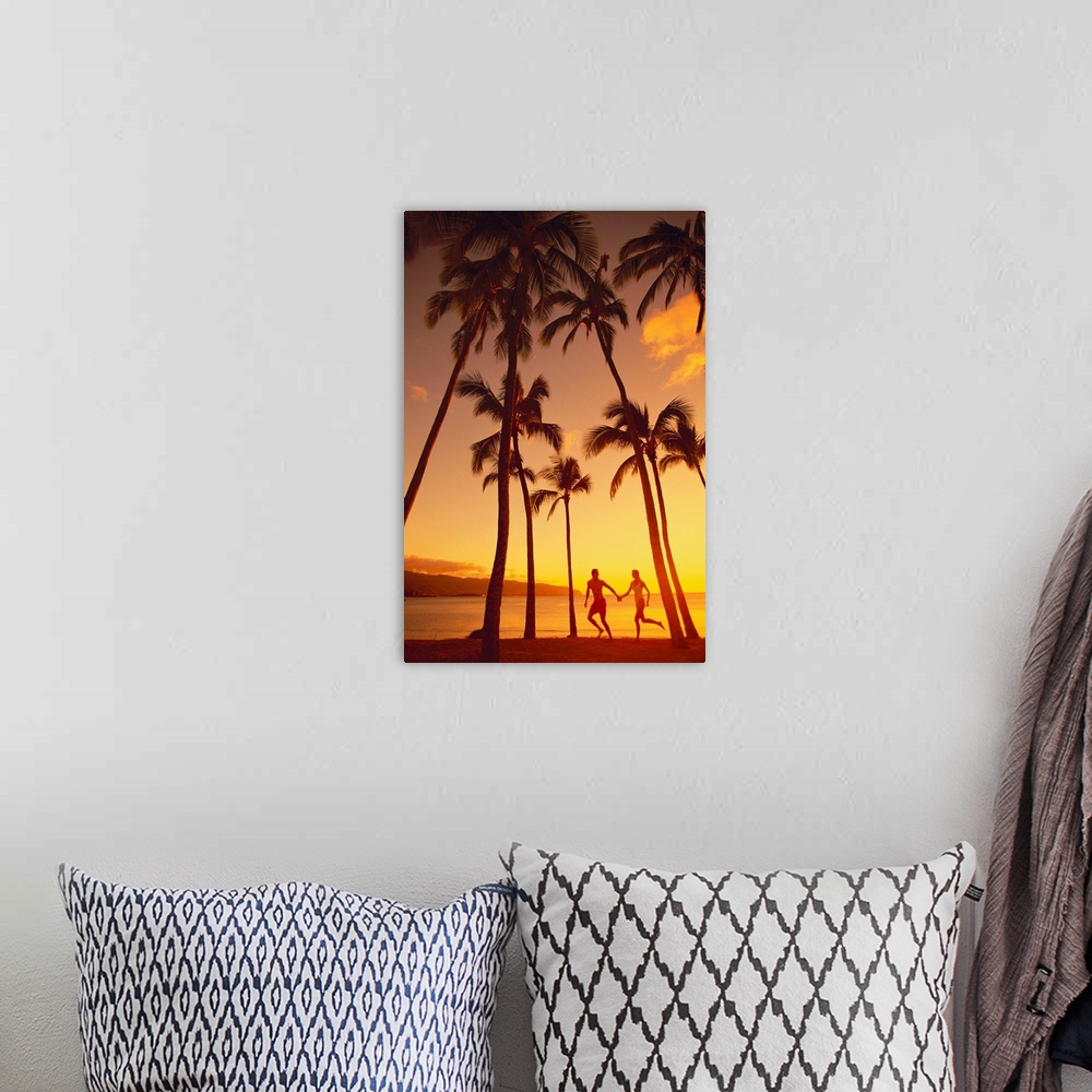 A bohemian room featuring Couple Runs Together Holding Hands Under Palm Trees At Sunset