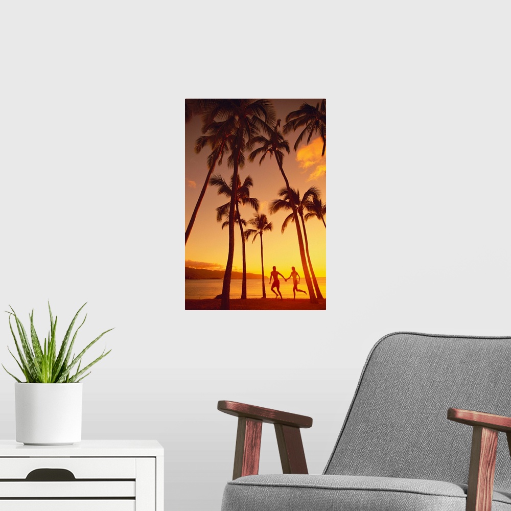 A modern room featuring Couple Runs Together Holding Hands Under Palm Trees At Sunset