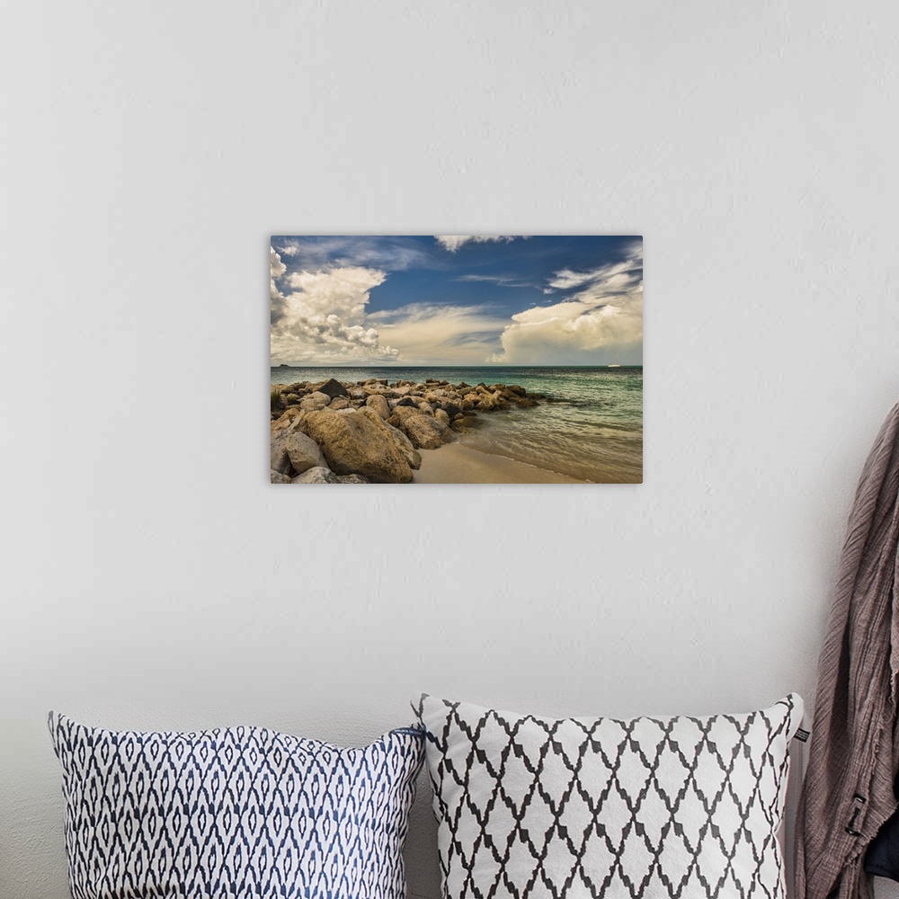 A bohemian room featuring Cumulus clouds over Dickenson Bay, St. John's, Antigua, West Indies