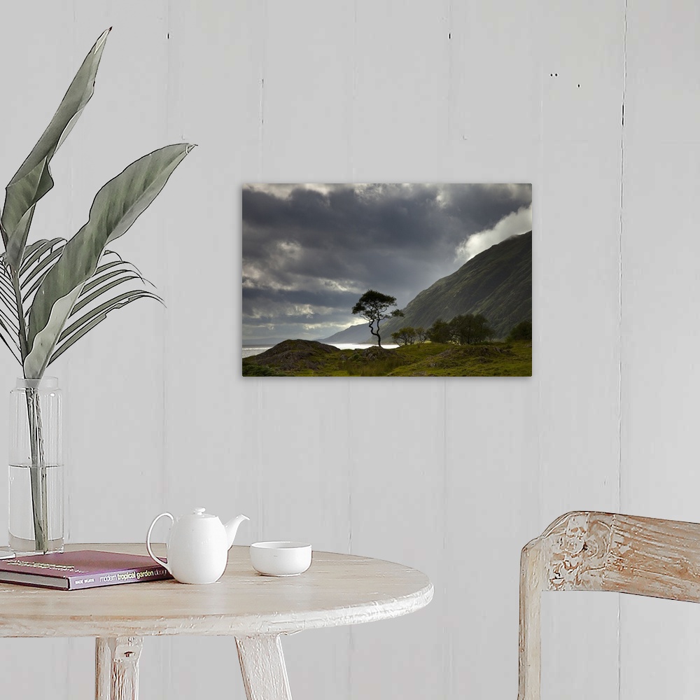 A farmhouse room featuring Dark Clouds Over A Landscape Along The Coast; Ardnamurchan, Argyll, Scotland