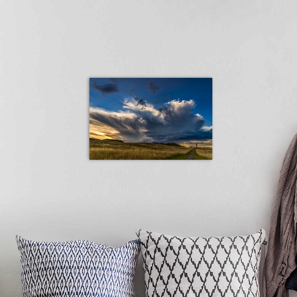 A bohemian room featuring Dramatic cloud formation over Souter Lighthouse at sunset; South Shields, Tyne and Wear, England.