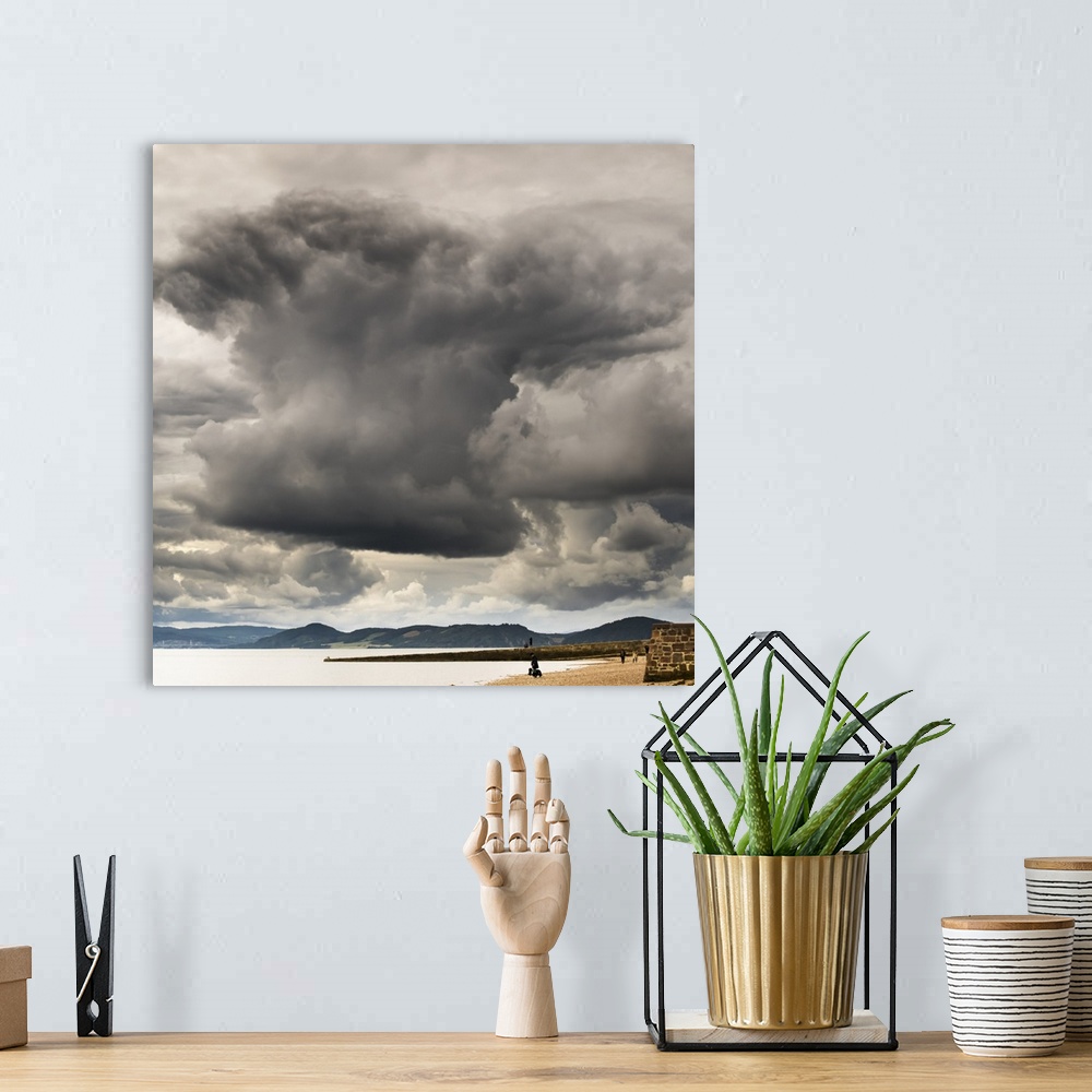 A bohemian room featuring Dramatic cloud formation over the coastline, Chanonry Point; Inverness, Scotland