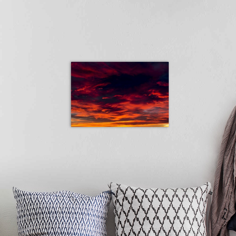 A bohemian room featuring Dramatic colourful cloud formations at sunset; Calgary, Alberta, Canada