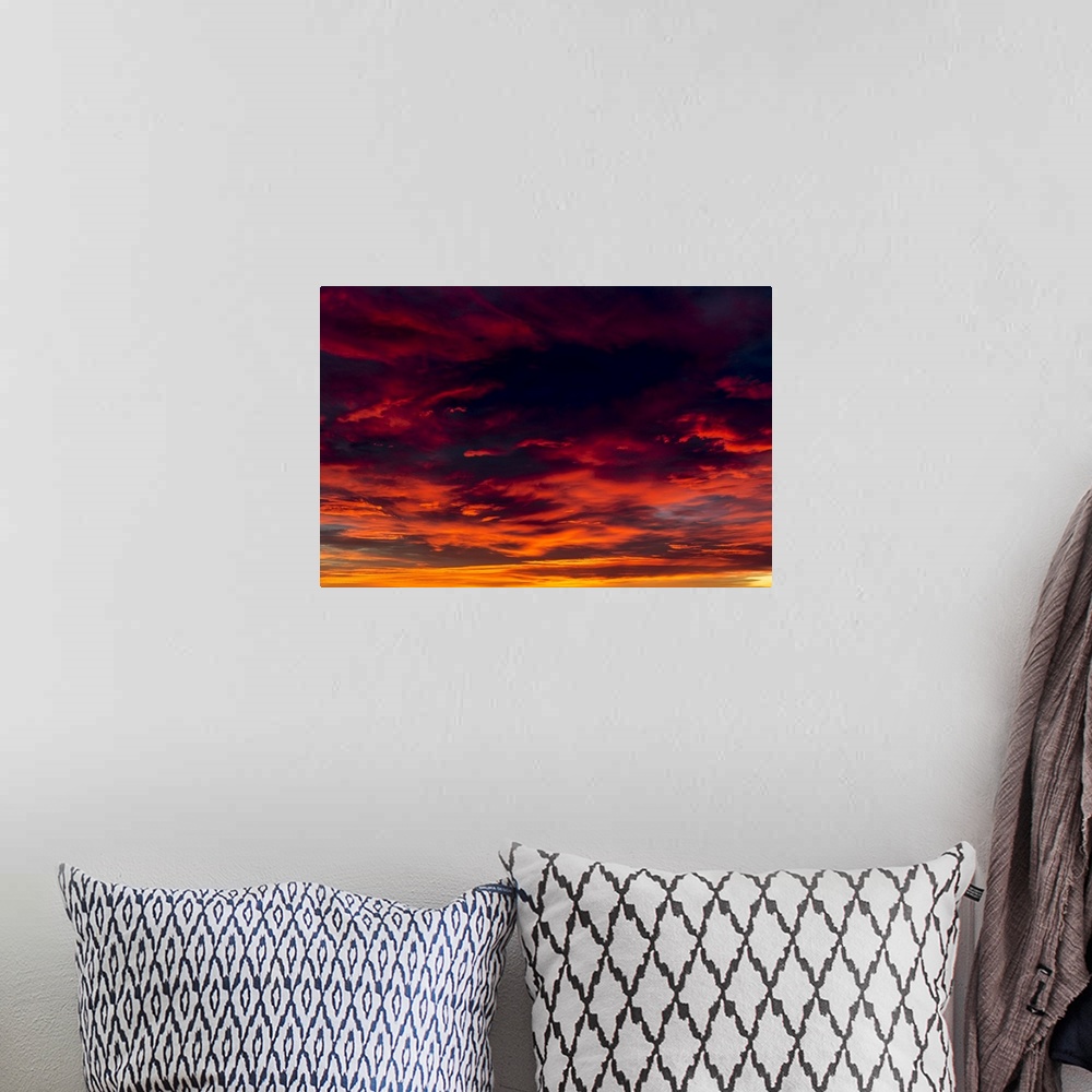A bohemian room featuring Dramatic colourful cloud formations at sunset; Calgary, Alberta, Canada