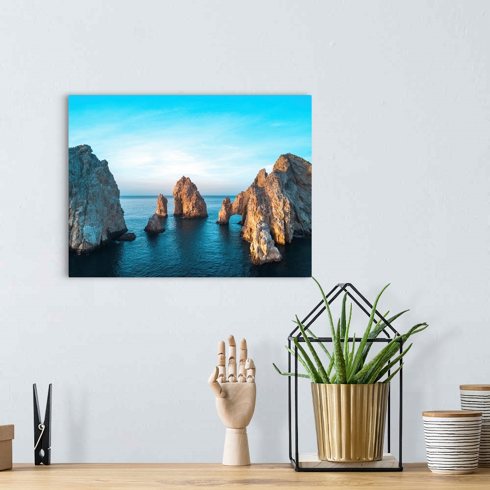 A bohemian room featuring Dramatic rock formations and Arcos de Cabo San Lucas (Arch of Cabo San Lucas) on the coast at Lan...