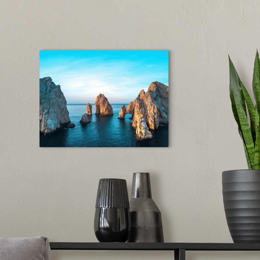 A modern room featuring Dramatic rock formations and Arcos de Cabo San Lucas (Arch of Cabo San Lucas) on the coast at Lan...