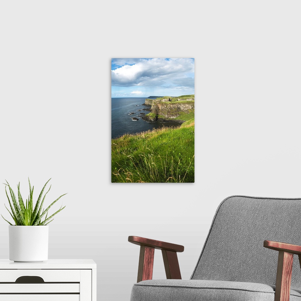 A modern room featuring Dunluce Castle on the Antrim Coast. County Antrim, Ireland.