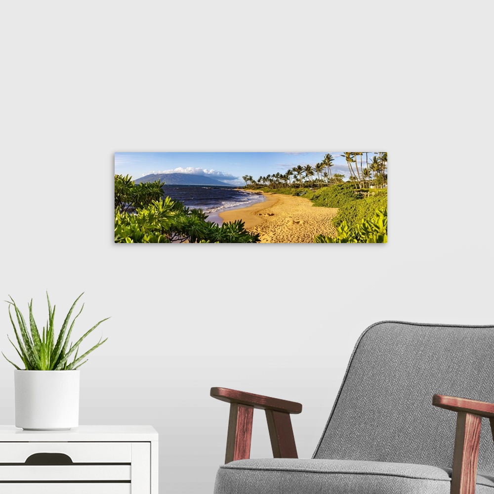 A modern room featuring Five images were combined for this dusk panorama of Ulua beach in the evening light, Wailea, Sout...
