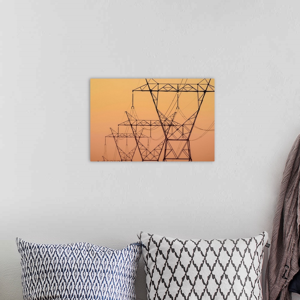 A bohemian room featuring Electrical transmission towers at sunset, Ohio