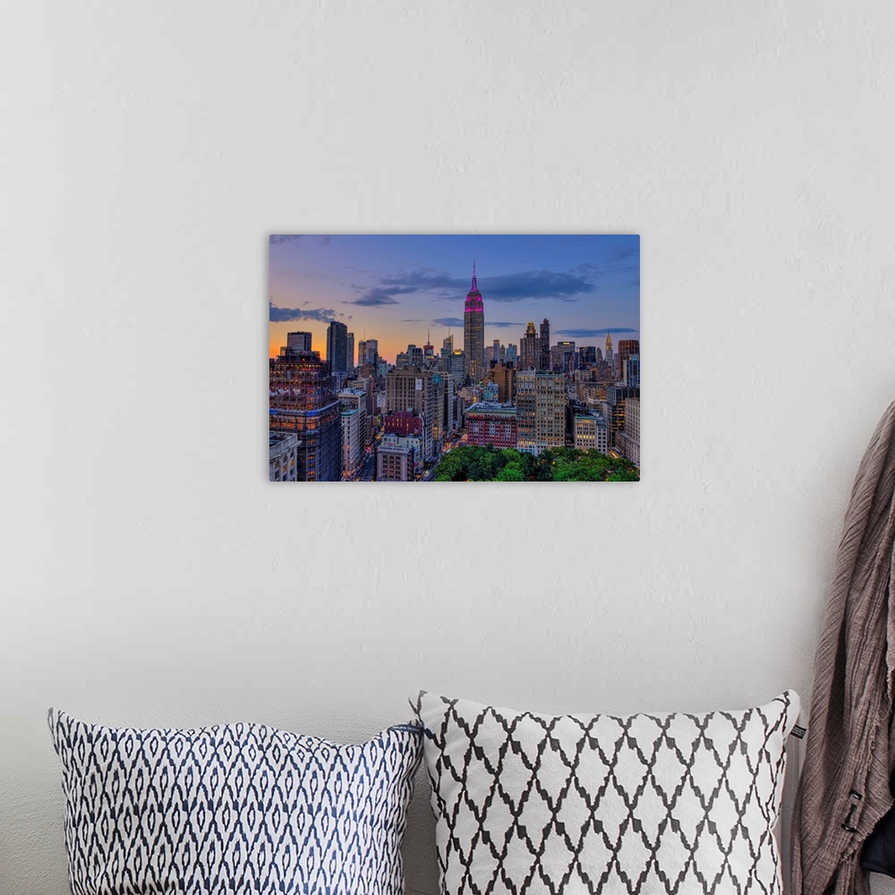 A bohemian room featuring Empire State Building at sunset with colours honoring the Military Order of the Purple Heart, New...
