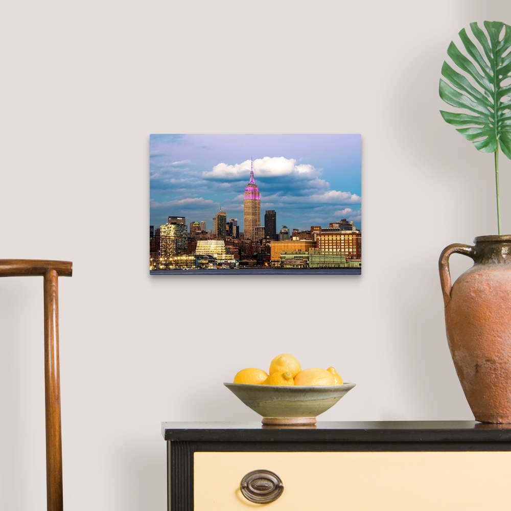 A traditional room featuring Empire State Building at sunset with colour honouring the Cupus Foundation of America, New York C...