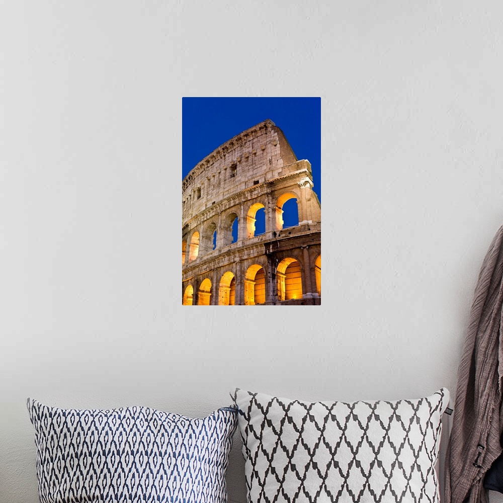 A bohemian room featuring Exterior View Of The Coliseum Amphitheatre At Night, Rome, Italy