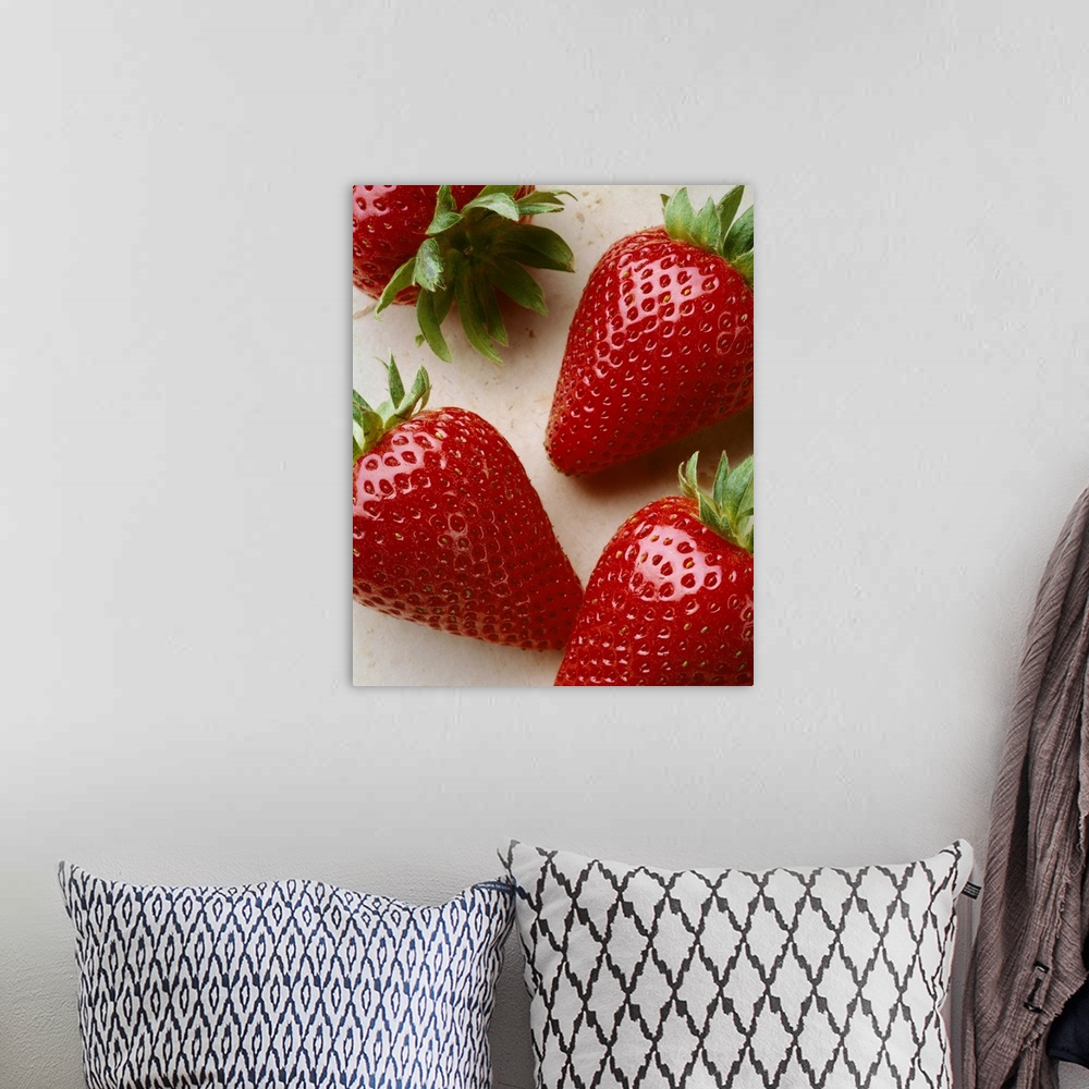 A bohemian room featuring Extreme closeup of ripe strawberries