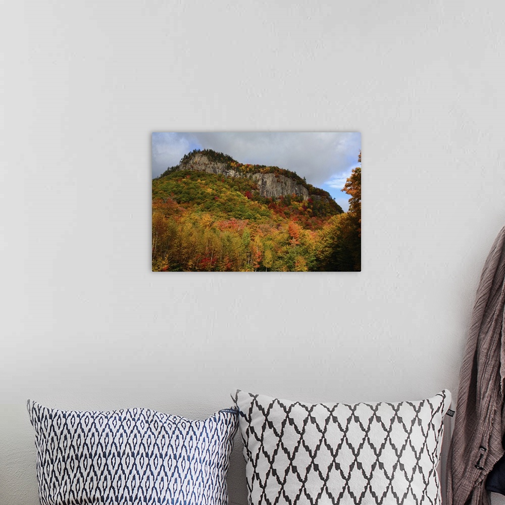A bohemian room featuring Scenic view of fall foliage and exposed rock on a hillside in the White Mountains, New Hampshire....