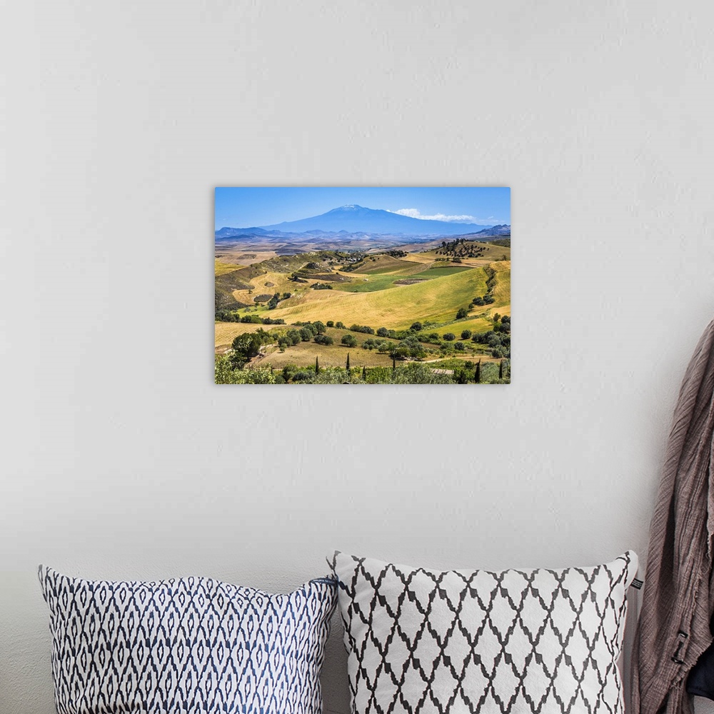 A bohemian room featuring Farmland with Mount Etna in the background near San Michele di Ganzaria, Sicily, Italy