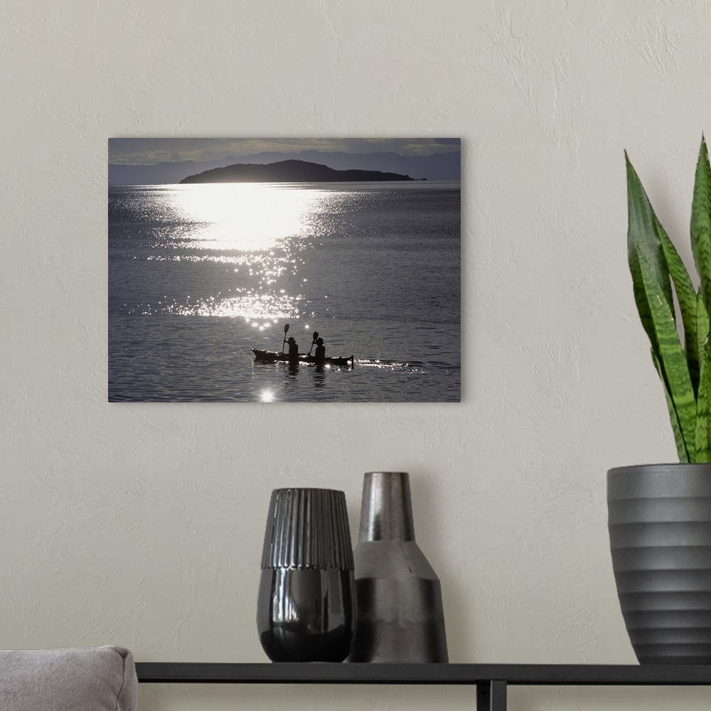 A modern room featuring Fishermen Going Past The Island Of Domwe At Dusk; Malawi, Africa